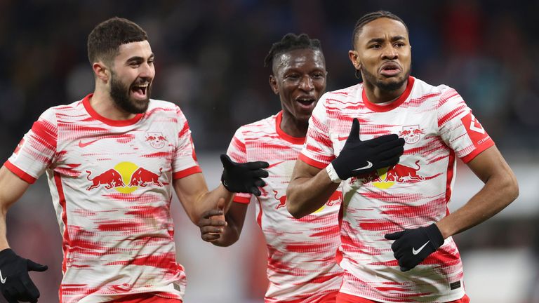 Leipzig player Christopher Nkunko celebrates after scoring against Cologne