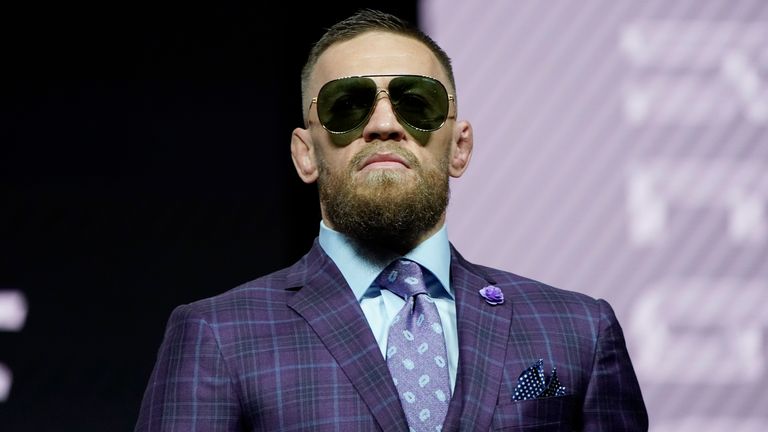 Conor McGregor walks on stage during a press conference for the UFC 264 mixed martial arts match Thursday, July 8, 2023, in Las Vegas