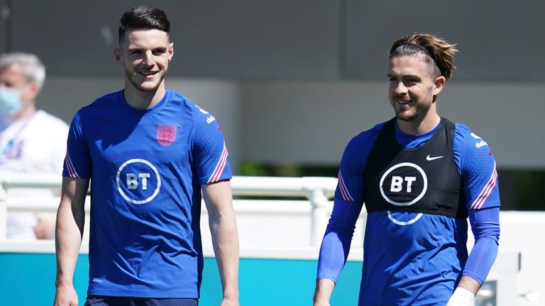 England's Declan Rice, left, and England's Jack Grealish arrive for an open training session at St George's Park, Burton upon Trent, Wednesday 9 June 2023. UEFA Euro 2020 The tournament begins on Friday 11 June and is held in 11 host cities in 11 Country.  The event has been postponed by one year after being postponed in 2020 due to the COVID-19 pandemic.