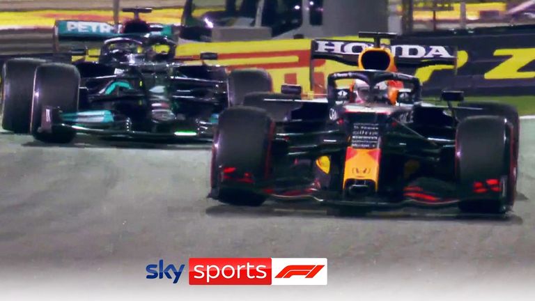 Max Verstappen passes Lewis Hamilton on the last lap in Abu Dhabi to win the 2023 F1 Championship!