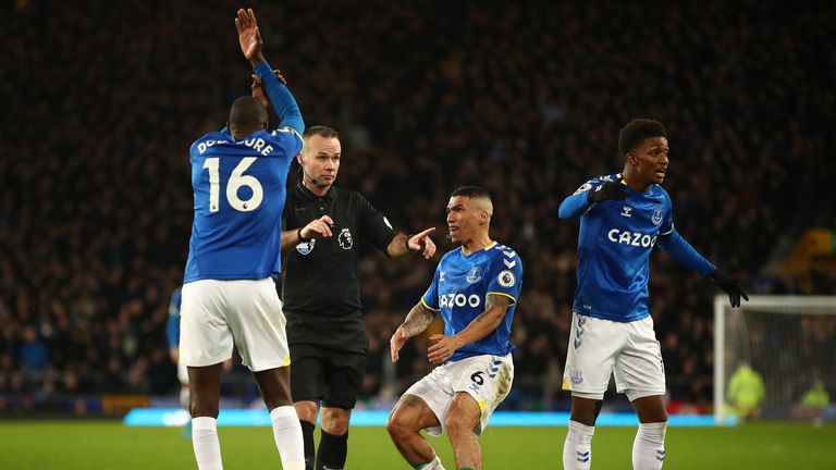 Alan and Abdullah Doukuri of Everton Platres appeals to referee Paul Tierney for handball during the English Premier League match between Everton and Manchester City at Goodison Park on February 26, 2023 in Liverpool, England.