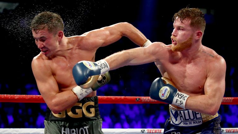 (LR) Canelo Alvarez punches Gennady Golovkin during the WBC, WBA, and IBF middleweight championship bout at the T-Mobile Arena on September 16, 2017 in Las Vegas, Nevada.
