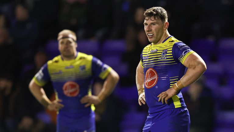 George Williams and Oliver Holmes look depressed during Warrington's defeat by the Catalans