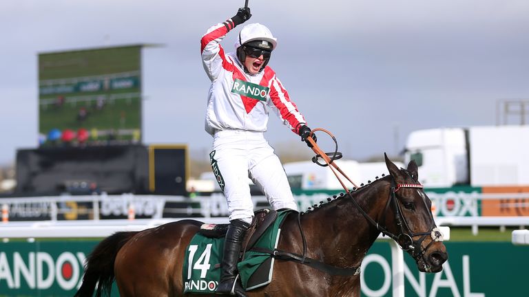 Gina Andrews roars as the Latenightpass wins the Foxhunters' title.  in Aintree