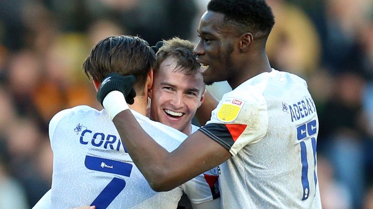 James Bree (centre) Luton Town celebrates scoring the third goal