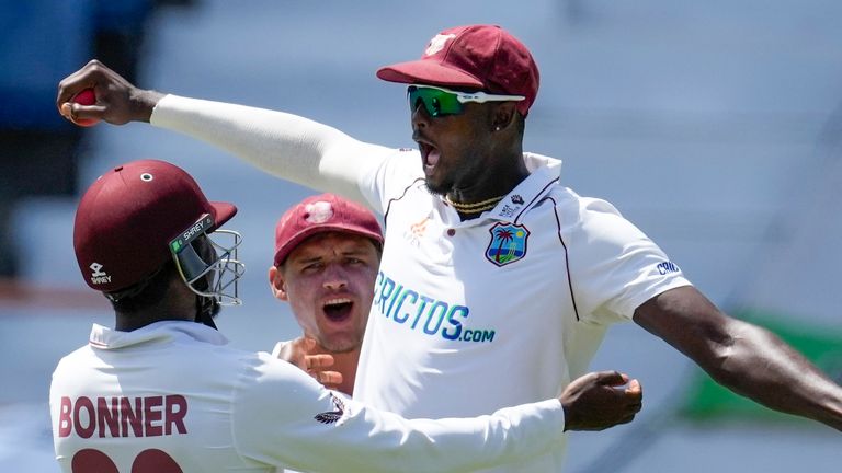Jason Holder celebrates after making a stunning catch in a leg slip to knock out Chris Woks on the morning of Day 4