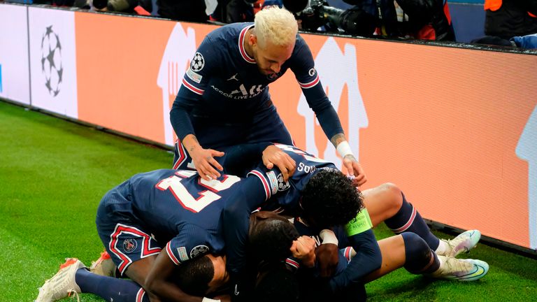 Mbappe is mobbed by his team-mates late on