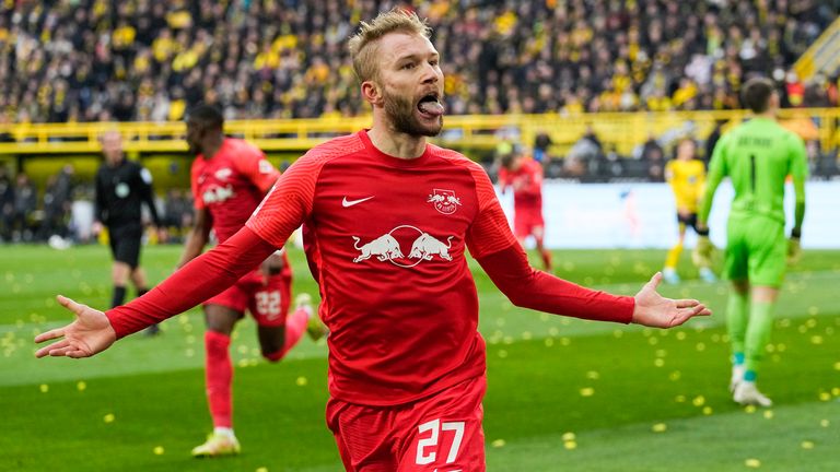 RB Leipzig's Konrad Laimer celebrated scoring his team's first goal against Dortmund.