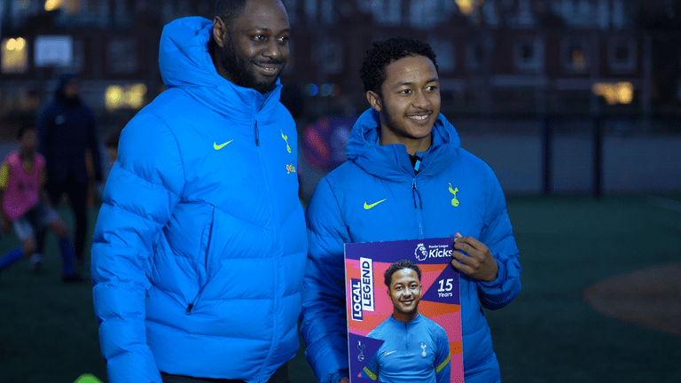 Ledley King presents an award at a Premier League Kicks session in Tottenham