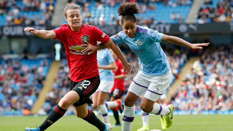 Hayley Ladd of Manchester United tackles Demi Stokes of Manchester City during the Women's Premier League match at the Etihad Stadium in 2019 (Photo: Andrew Yates/SportImage)