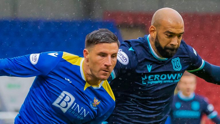 PERTH, SCOTLAND - OCTOBER 2: St Johnston's Michael O'Halloran and Dundee Liam Fontaine play during the Premier League match between St Johnston and Dundee at MacDermid Park on October 2, 2023, in Perth, Scotland.  (Photo by Roddy Scott / SNS Group)