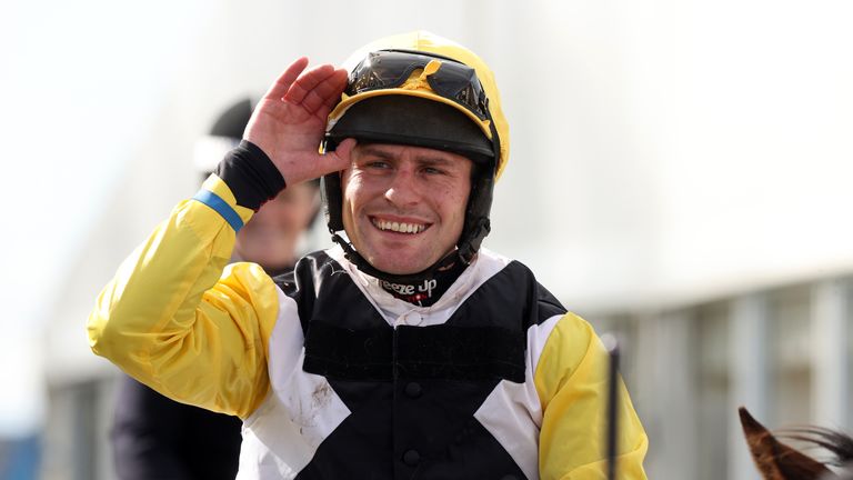 Rob James greets fans after winning the Scottish National League against Wayne My Wings