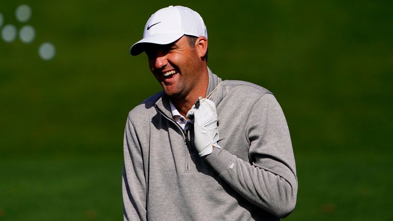 Scotty Schaeffler laughs while on the driveway during a Masters training session