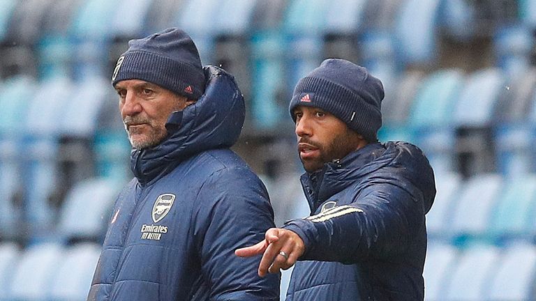 Photo of Steve Bould and Ryan Gary watching the Arsenal U-23 match in October 2020