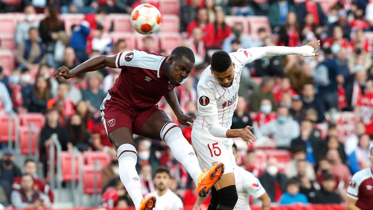 Kurt Zouma wrestles for the ball with Youssef Al-Nusairi
